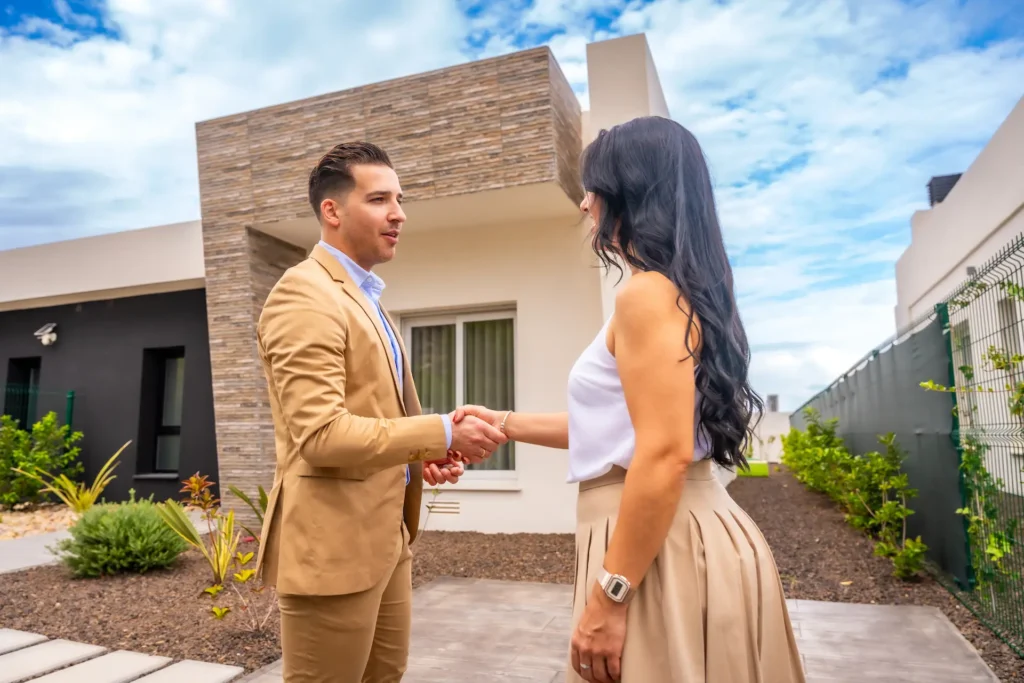 woman shaking hands to a real estate agent 2024 12 10 00 55 46 utc